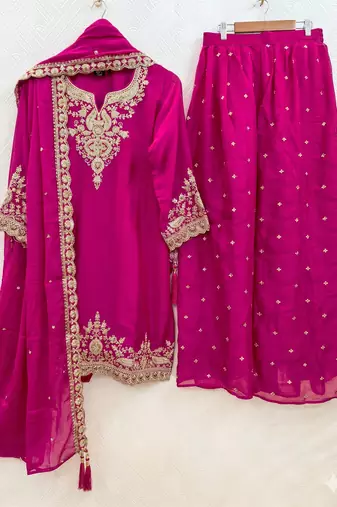 Womens silk embroidered sharara suit with golden zari work and lace border dupatta