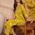 Womens silk blend ethnic motifs printed yellow kurta and trousers with dupatta