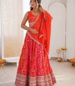Orange Color Thread With Sequence Work Faux Georgette Lehenga Choli Set