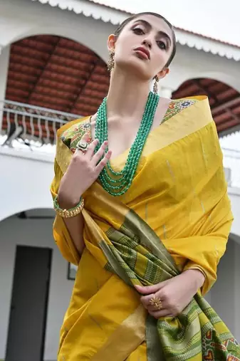 Yellow color khadi  silk blend weaving patola sarees