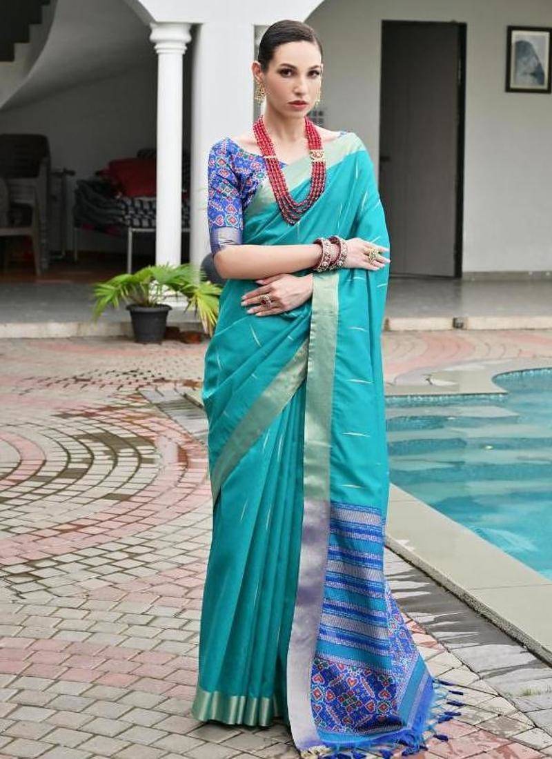 Sea green color khadi  silk blend weaving patola sarees