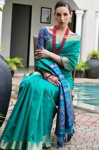 Sea green color khadi  silk blend weaving patola sarees
