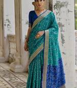 Firozi color raw silk pochampally ikkat saree