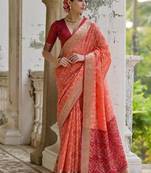 Orange color raw silk pochampally ikkat saree