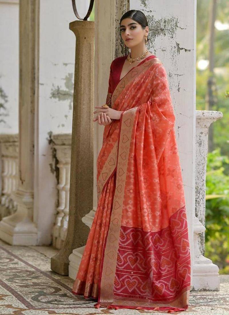 Orange color raw silk pochampally ikkat saree