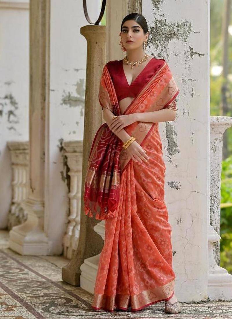 Orange color raw silk pochampally ikkat saree