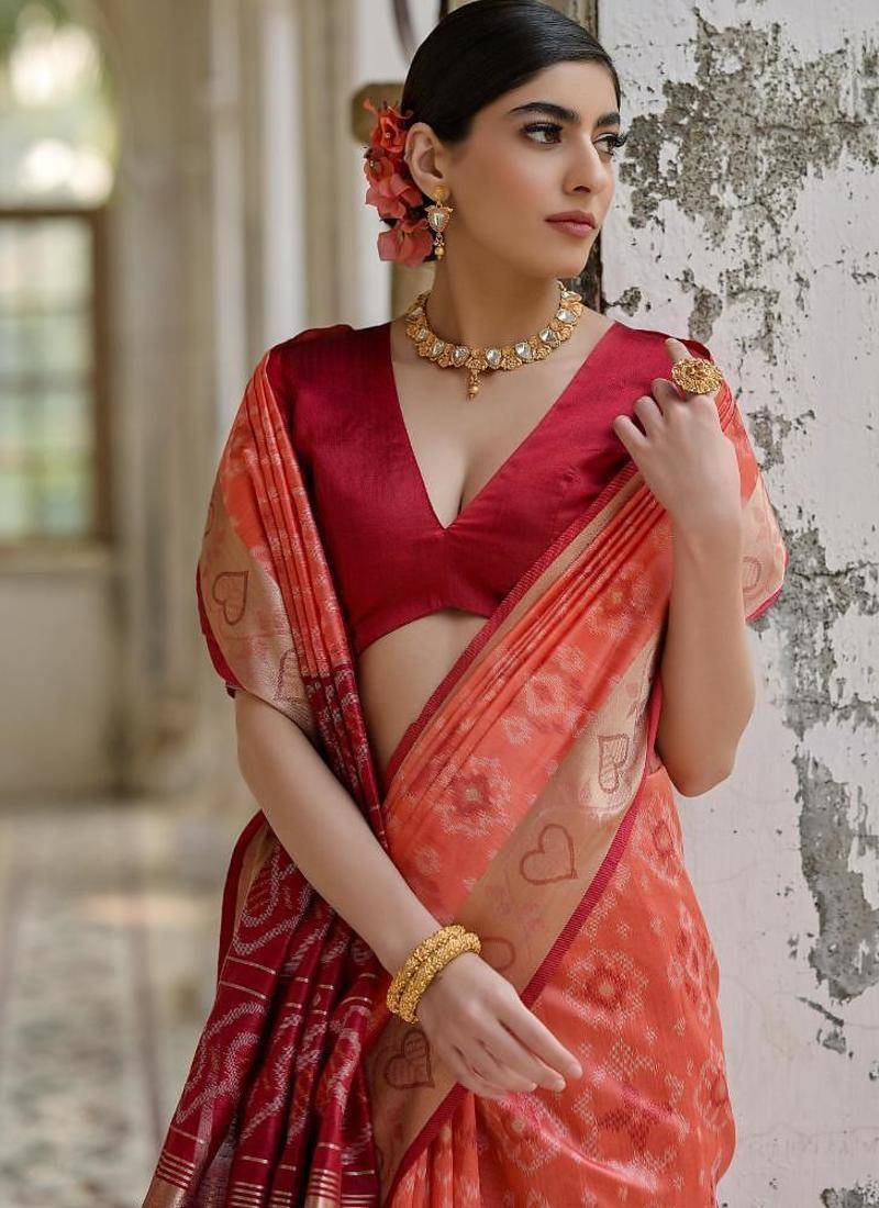 Orange color raw silk pochampally ikkat saree