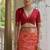 Orange color raw silk pochampally ikkat saree
