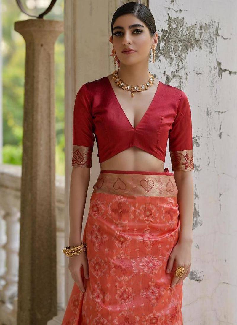Orange color raw silk pochampally ikkat saree