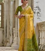 Yellow color raw silk pochampally ikkat saree