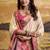 Cream patola silk blend party wear saree