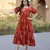 Rust color designer printed fancy partywear long kurti for girlie festive looks