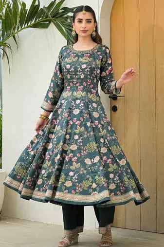 Green color elegant sophisticated rich party looks readymade dress