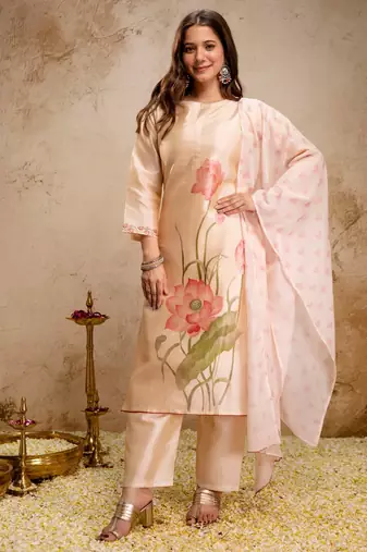Cream color aasam silk fabric designer partywear stithed suit
