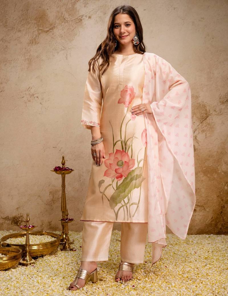 Cream color aasam silk fabric designer partywear stithed suit