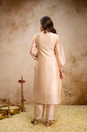 Cream color aasam silk partywear stitched suit
