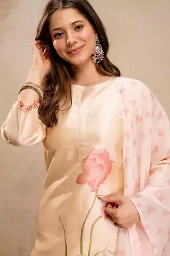 Cream color aasam silk partywear stitched suit