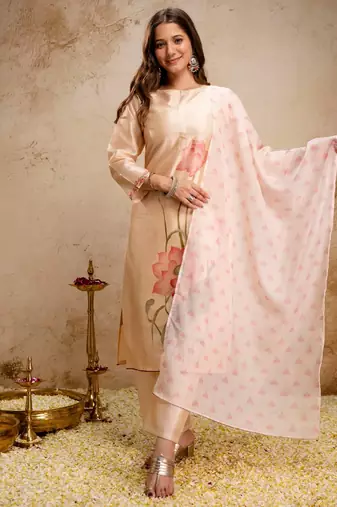 Cream color aasam silk partywear stitched suit