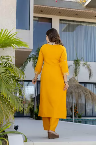 Yellow color chanderi partywear stitched suit