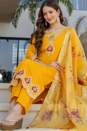 Yellow color chanderi partywear stitched suit