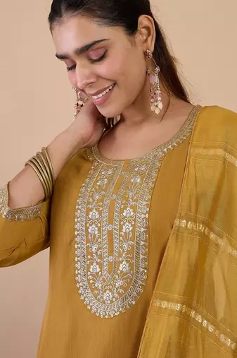 Mustard color beautiful embroidered graceful partywear ceremonial suit