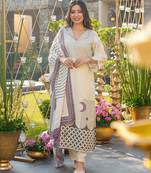Cream color muslin fabric printed graceful girlie kurta set for party looks