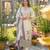 Cream color muslin fabric printed graceful girlie kurta set for party looks