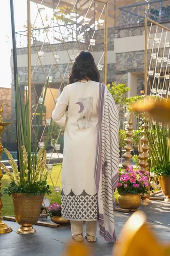 Cream color muslin printed graceful kurta set for party looks