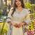 Cream color muslin fabric printed graceful girlie kurta set for party looks