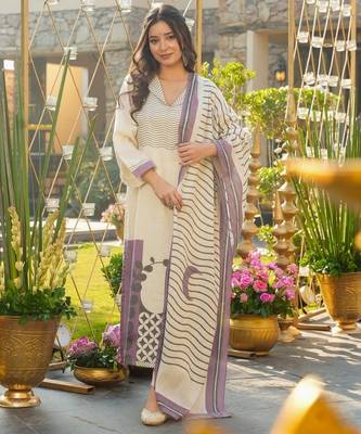 Cream color muslin printed graceful kurta set for party looks 4