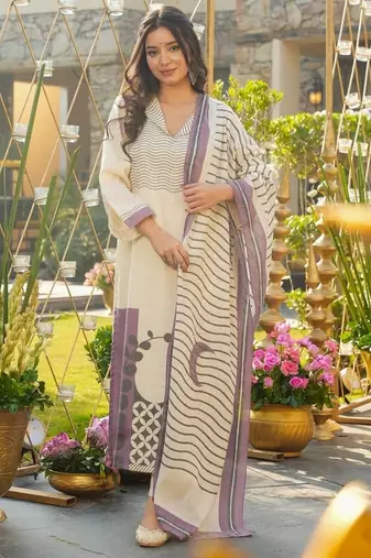 Cream color muslin printed graceful kurta set for party looks