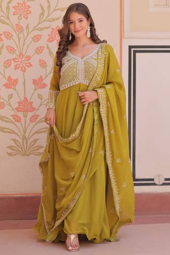 Green color heavy and ethnic coading embroidered with beads work wedding special gown with dupattta