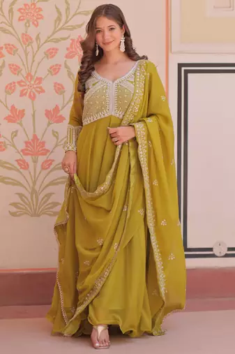Green color heavy and ethnic coading embroidered with beads work wedding special gown with dupattta