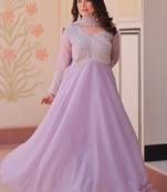 Lavender color heavy and ethnic coading embroidered with beads work wedding special gown with dupattta