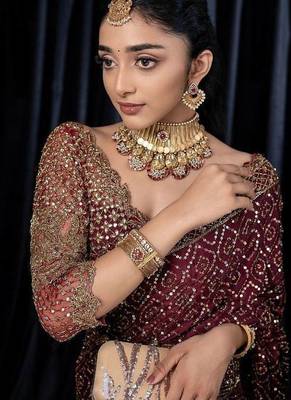 Wine dori zari and sequins work kasturi silk blend georgette saree 1