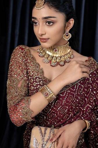 Wine dori zari and sequins work kasturi silk blend georgette saree