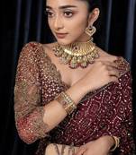 Wine dori zari and sequins work kasturi silk blend georgette saree