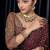 Wine dori zari and sequins work kasturi silk blend georgette saree