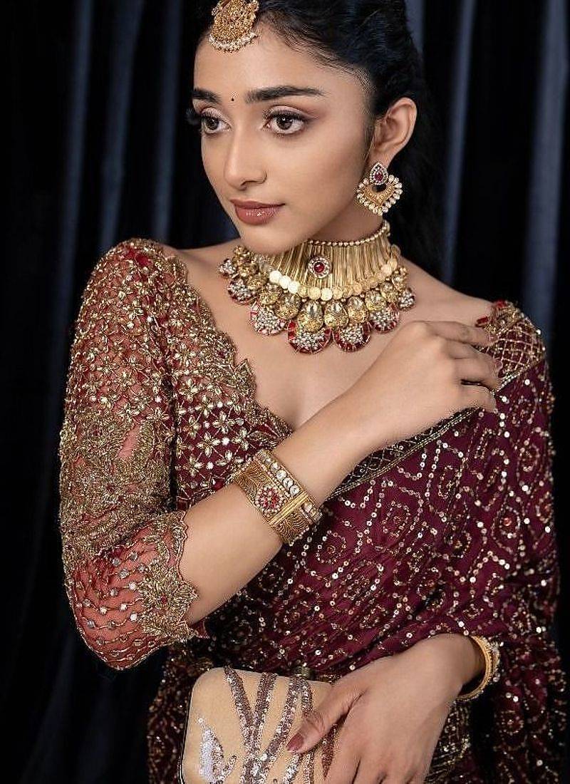 Wine dori zari and sequins work kasturi silk blend georgette saree