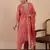 Peach color sophisticated cotton blend fabric embroidered fancy kurta set