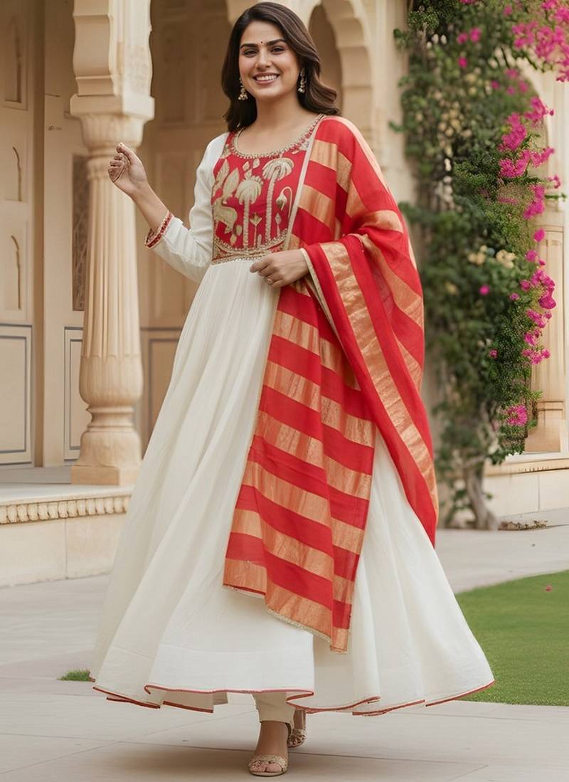 Off white color rich girlie looks silk   fabric embroidered readymade partywear suit for girl