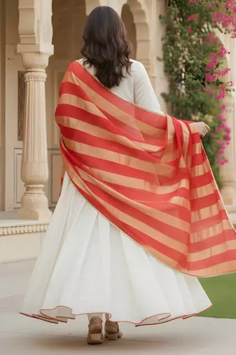 Off white color rich looks silk embroidered readymade partywear suit for girl