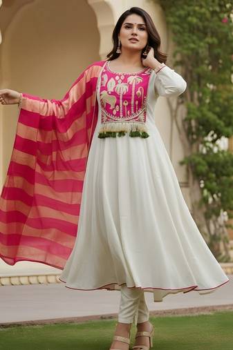 Off white color rich girlie looks silk   fabric embroidered readymade partywear suit for girl