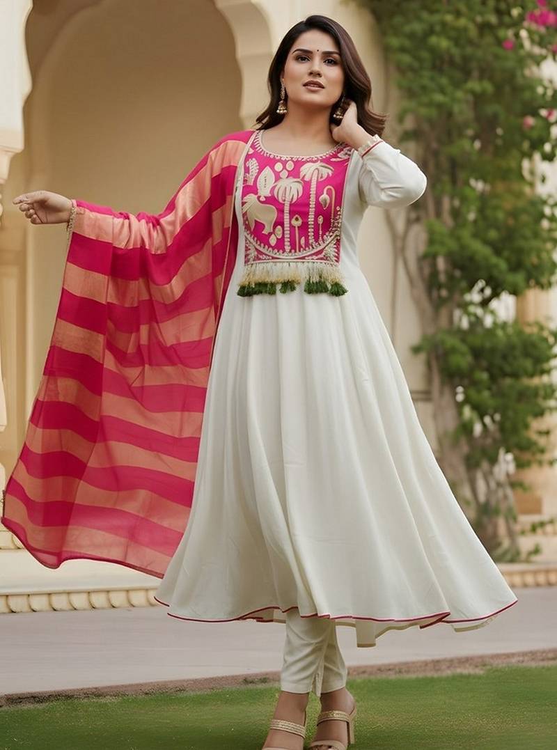 Off white color rich girlie looks silk   fabric embroidered readymade partywear suit for girl