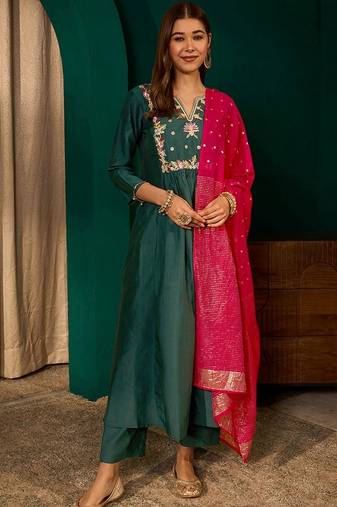 Green color rich girlie looks silk slub fabric embroidered readymade partywear suit for girl
