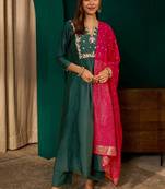 Green color rich girlie looks silk slub fabric embroidered readymade partywear suit for girl
