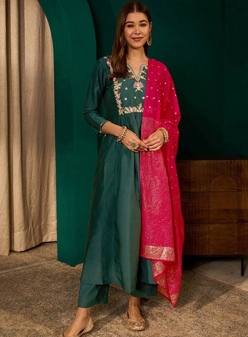 Green color rich girlie looks silk slub fabric embroidered readymade partywear suit for girl