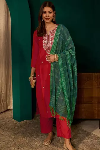 Red color rich girlie looks silk slub fabric embroidered readymade partywear suit for girl
