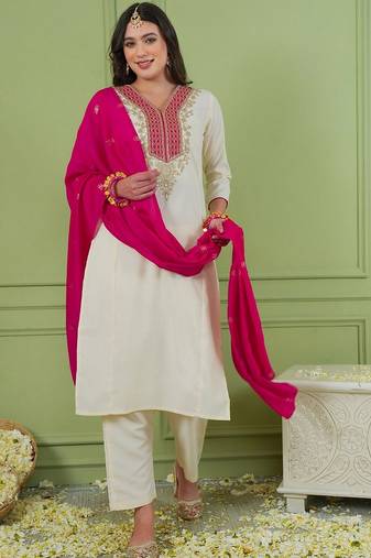 Off white color rich girlie looks silk fabric embroidered readymade partywear suit for girl