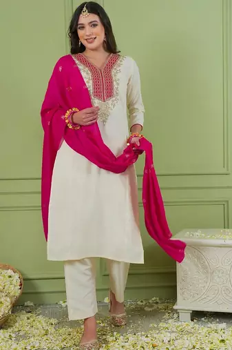 Off white color rich girlie looks silk fabric embroidered readymade partywear suit for girl